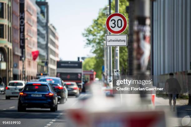 Traffic sign for speed limit and with the lettering 'Luftreinhaltung' is pictured in the city center on May 04, 2018 in Berlin, Germany.