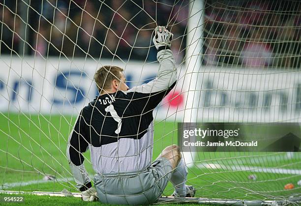 Georg Koch of Kaiserslautern takes a break in the goal during the UEFA Cup Quarter Finals second leg match against PSV Eindhoven played at the...
