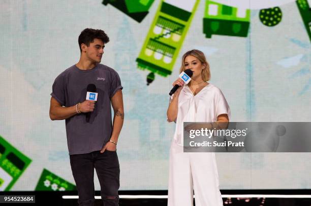 Jack Gilinsky and Olivia Holt speak at Key Arena on May 3, 2018 in Seattle, Washington.