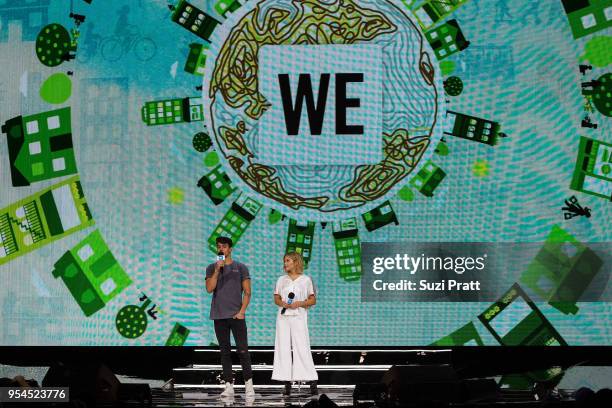 Jack Gilinsky and Olivia Holt speak at Key Arena on May 3, 2018 in Seattle, Washington.