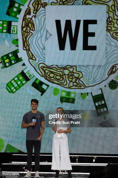 Jack Gilinsky and Olivia Holt speak at Key Arena on May 3, 2018 in Seattle, Washington.