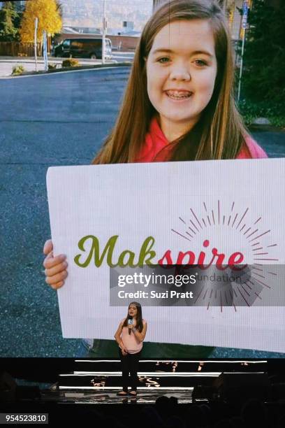 Makenna Schwab of the MakeSpire Foundation speaks at Key Arena on May 3, 2018 in Seattle, Washington.