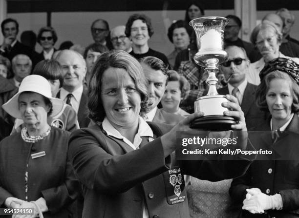 England women's cricket captain Rachael Heyhoe-Flint raises the World Cup after England beat Australia by 92 runs in the inaugural Women's World Cup...