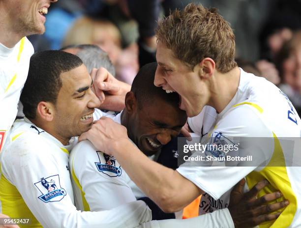 Aaron Lennon and Michael Dawson celebrate with Jermain Defoe of Tottenham Hotspur after Defoe scores his side's second goal during the Barclays...