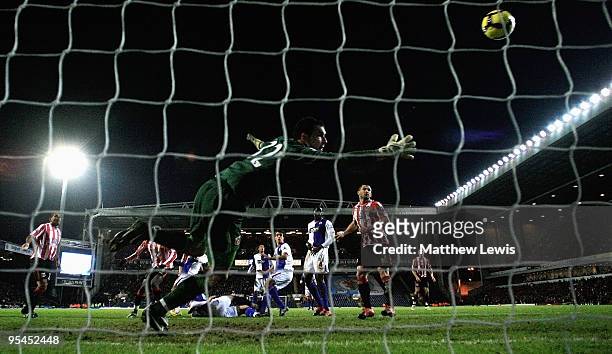 Martin Fulop of Sunderland is beaten by a header from El Hadji Diouf of Blackburn during the Barclays Premier League match between Blackburn Rovers...