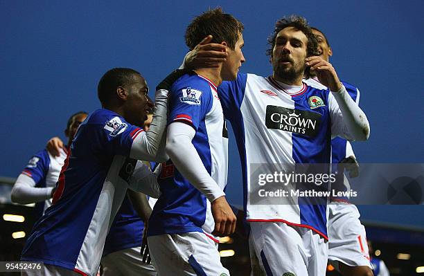 Morten Gamst Pedersen of Blackburn is congratulated his goal by his team mates during the Barclays Premier League match between Blackburn Rovers and...