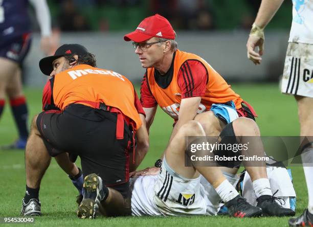 David Kaetau Havili of the Crusaders reacts after a collision with Jack Maddocks of the Rebels during the round 12 Super Rugby match between the...