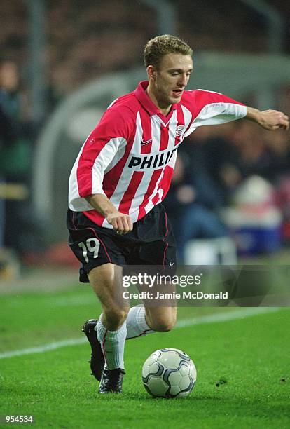Dennis Rommedahl of PSV Eindhoven runs with the ball during the UEFA Cup Quarter Finals second leg match against Kaiserslautern played at the Philips...