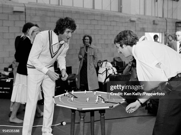England cricketers Bob Willis and Ian Botham play a game of 'Test Match' table-top cricket as the England team meet at Lord's Cricket Ground, London,...