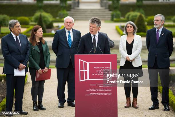 Jonathan Powell, former Downing Street Chief of Staff and chief British negotiator on Northern Ireland reads a statement during the International...