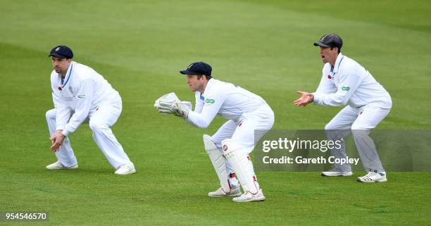 Derbyshire wicketkeeper Gary Wilson alongside slips Billy Godleman and Wayne Madsen during day two of Specsavers County Championship Division Two...