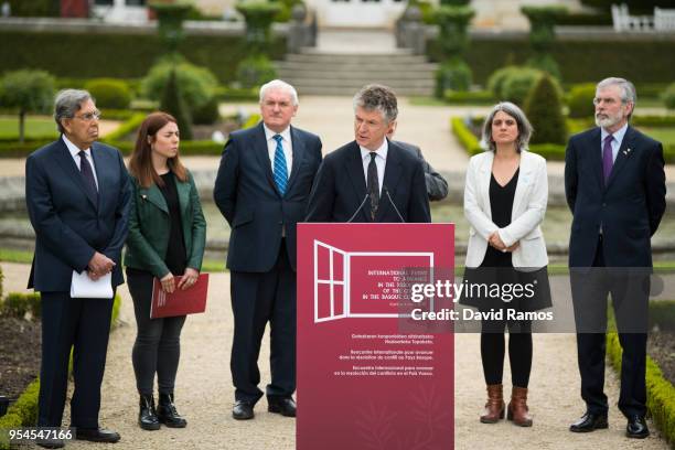 Jonathan Powell, former Downing Street Chief of Staff and chief British negotiator on Northern Ireland reads a statement during the International...