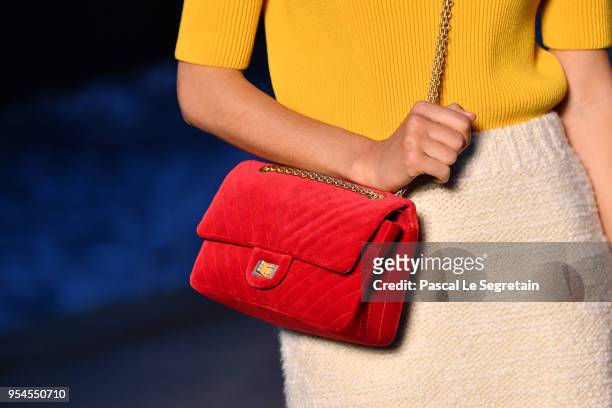 Alma Jodorowsky,bag detail, attends the Chanel Cruise 2018/2019 Collection at Le Grand Palais on May 3, 2018 in Paris, France.