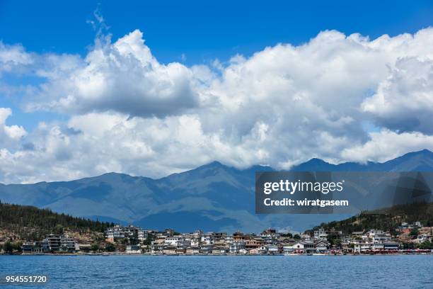 landscape view of village is in the middle of erhai lake. - wiratgasem stock pictures, royalty-free photos & images