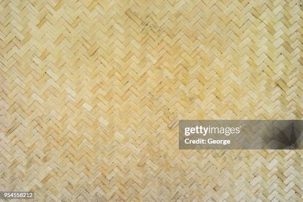 old woven bamboo texture for background - wicker mat stock pictures, royalty-free photos & images