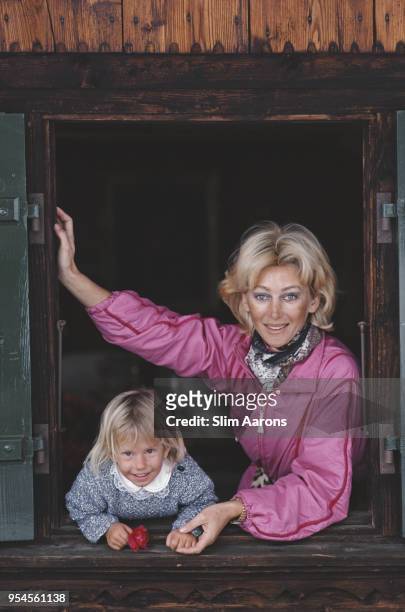 Princess Bianca Hanau-Schaumburg with a child at her Gstaad chalet, February 1984.