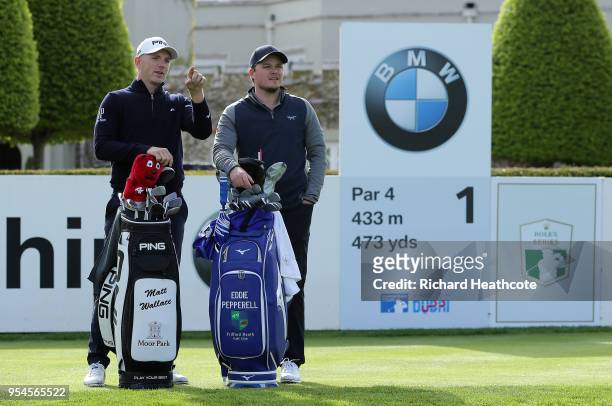 Matt Wallace and Eddie Pepperell of England chat on the first tee of the west course during the media day for the BMW PGA Championship at The...