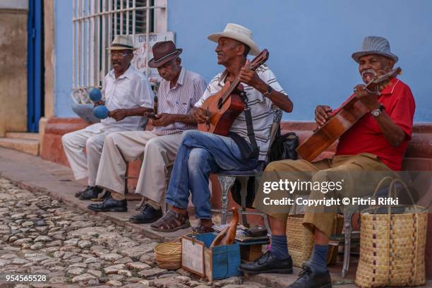 cuban musicians on the street - sancti spiritus stock-fotos und bilder