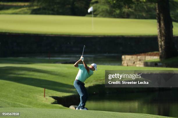 Shawn Stefani plays his approach shot on the seventh hole during the second round of the 2018 Wells Fargo Championship at Quail Hollow Club on May 4,...