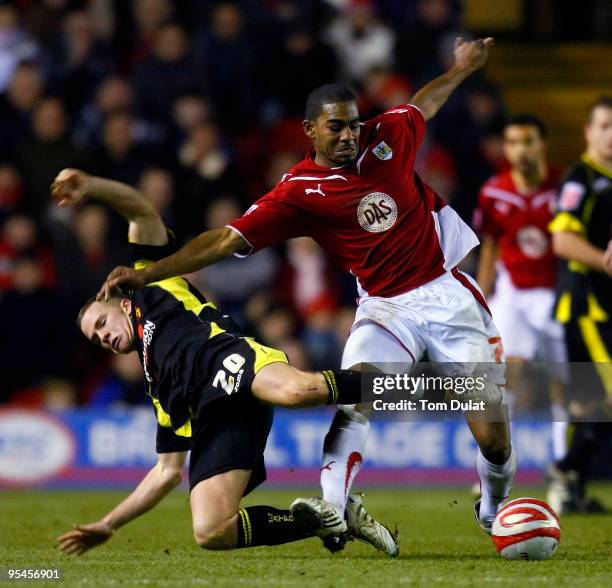 Marvin Elliott of Bristol City and Tom Cleverley of Watford battle for the ball during the Coca Cola Championship match between Bristol City and...