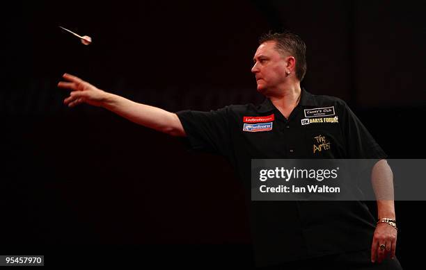 Kevin Painter of England in action against Vincent van der Voort of The Netherlands during the 2010 Ladbrokes.com World Darts Championship Round One...