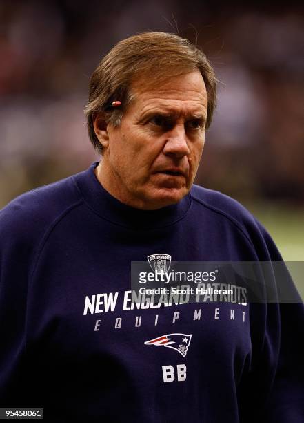 Bill Belichick, Head Coach of the New England Patriots is seen on the field during pregame warm ups prior to the start of the game against the New...