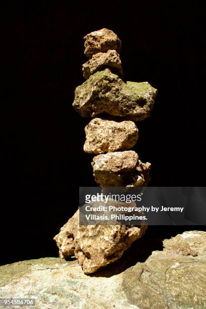 stacked rocks in callao cave, cagayan - jeremy chan stock pictures, royalty-free photos & images