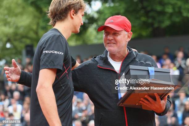 Alexander Zverev of Germany attends the award hand-over for his father Alexander Zverev as "DTB-Coach of the year 2017" on day 7 of the BMW Open by...