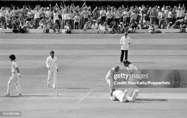 West Indies batsman Larry Gomes walks off after being caught at short leg by Mike Gatting of England off the bowling of Ian Botham during the 2nd...