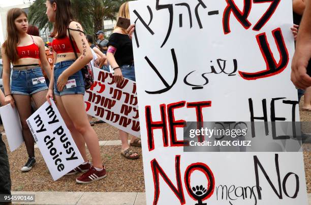 Participants of the annual "SlutWalk" march through the Israeli Mediterranean coastal city of Tel Aviv on May 4, 2018 to protest against rape...