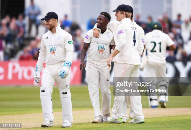 Fidel Edwards of Hampshire celebrates with teammates after taking the wicket of Samit Patel of Nottinghamshire during the Specsavers County...