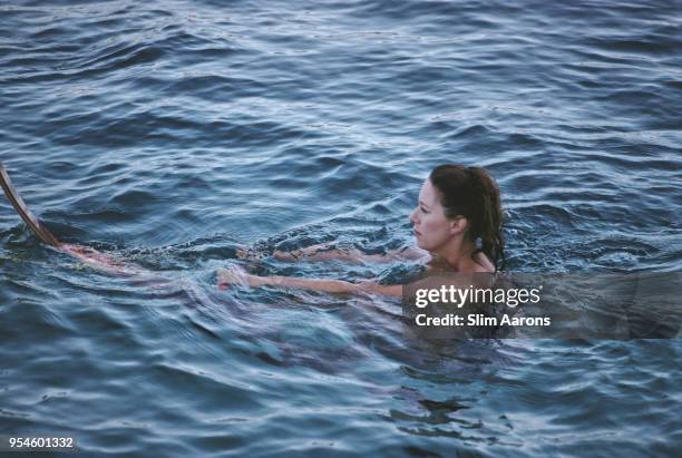 Princess Margaret, Countess of Snowdon , swimming while on holiday in Costa Smeralda, Sardinia, Italy, August 1987.