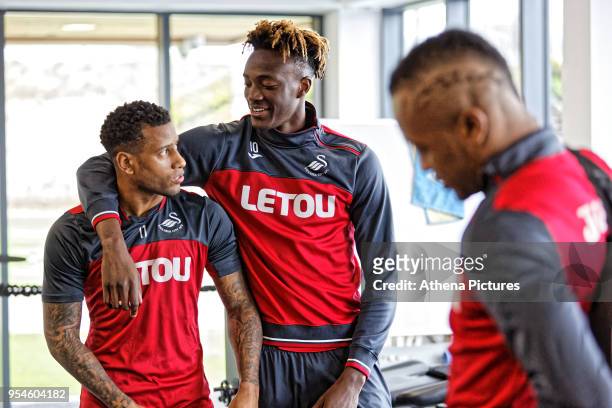 Luciano Narsingh is embraced by Tammy Abraham in the gym during the Swansea City Training at The Fairwood Training Ground on May 02, 2018 in Swansea,...