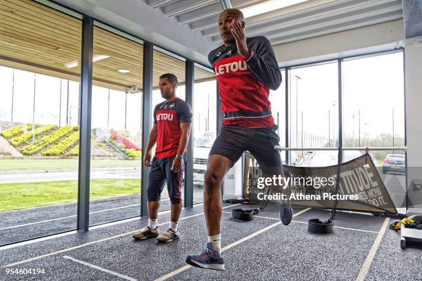 Wayne Routledge and Andre Ayew exercise in the gym during the Swansea City Training at The Fairwood Training Ground on May 02, 2018 in Swansea, Wales.