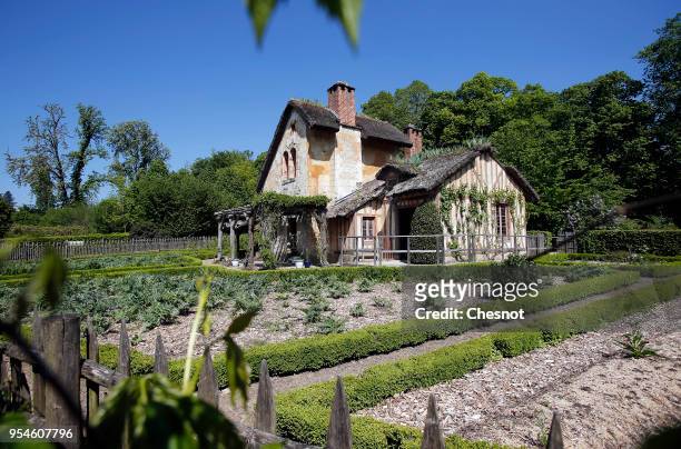 The gardener's house is visible in the garden of The Hameau de la Reine during its opening to the public after restoration, at the Versailles Palace...