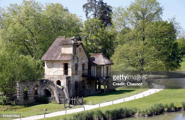 Mill is visible in the garden of The Hameau de la Reine during its opening to the public after restoration, at the Versailles Palace on May 4, 2018...