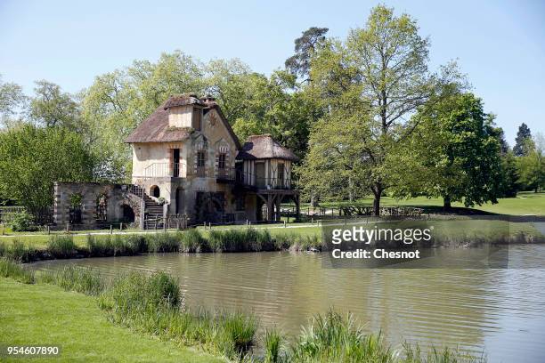 Mill is visible in the garden of The Hameau de la Reine during its opening to the public after restoration, at the Versailles Palace on May 4, 2018...