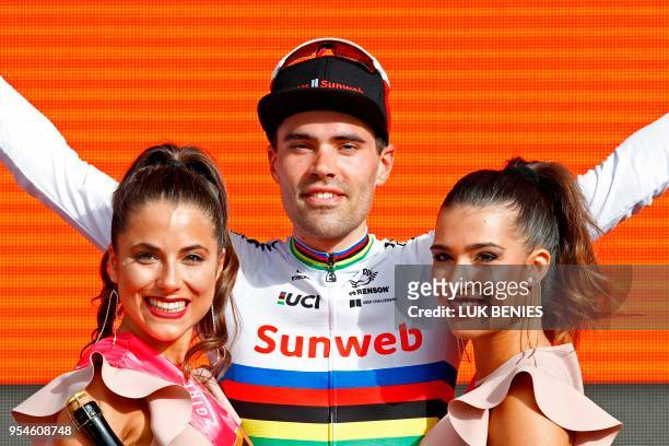 Netherlands' rider of team Sunweb Tom Dumoulin celebrates on the podium after winning the 1st stage of the 101st Giro d'Italia, Tour of Italy, on May...