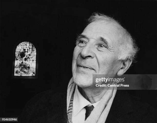 Artist Marc Chagall in front of a stained glass window he designed at All Saints' Church in Tudeley, Kent, 18th November 1967.