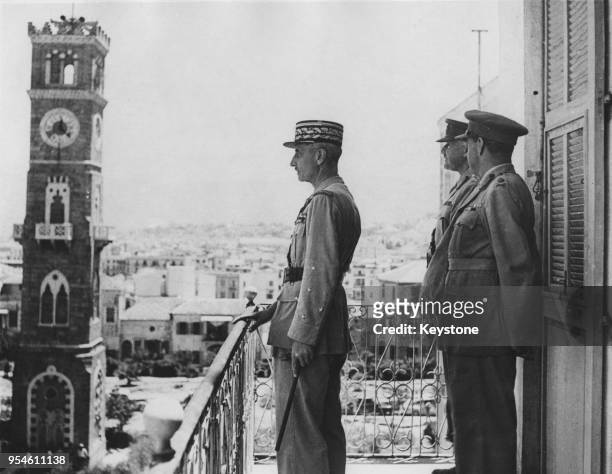 French General Georges Catroux , with British General Sir Henry Maitland Wilson and Australian Lieutenant General John Lavarack behind him, on the...