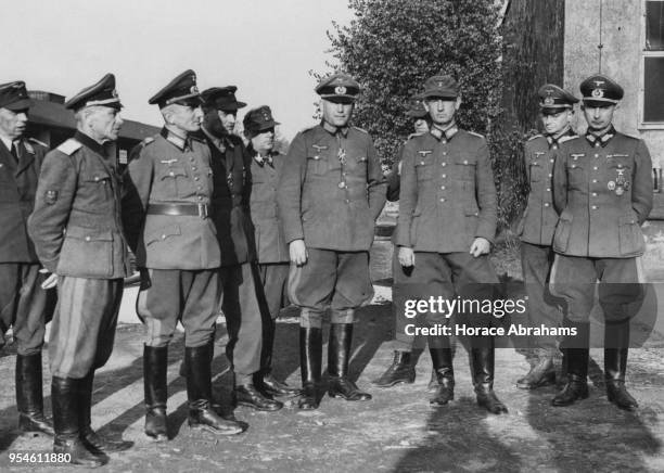 Nine German Generals and a Russian General who had defected to the Wehrmacht, surrender to the American forces at Bad Aibling in Germany, during...