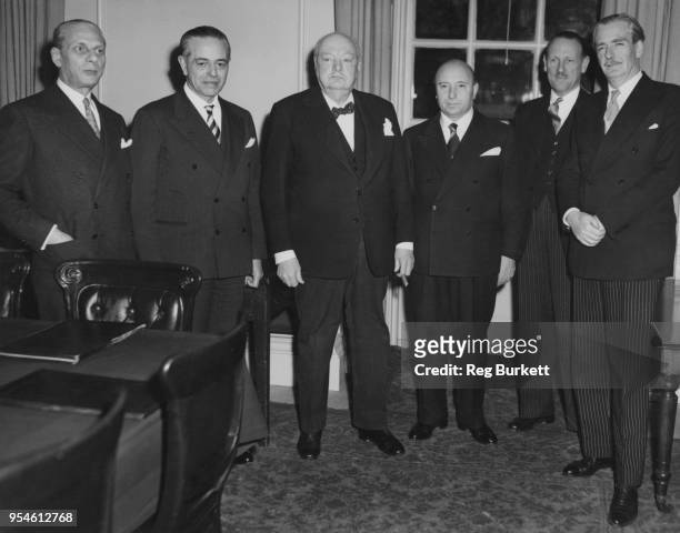 Italian Prime Minister Mario Scelba and Italian Foreign Minister Gaetano Martino pay an official visit to London, 15th February 1955. From left to...