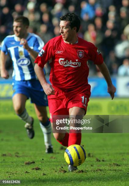 Robbie Fowler of Liverpool in action during the Barclays Premiership match between Wigan Athletic and Liverpool at the JJB Stadium in Wigan on...