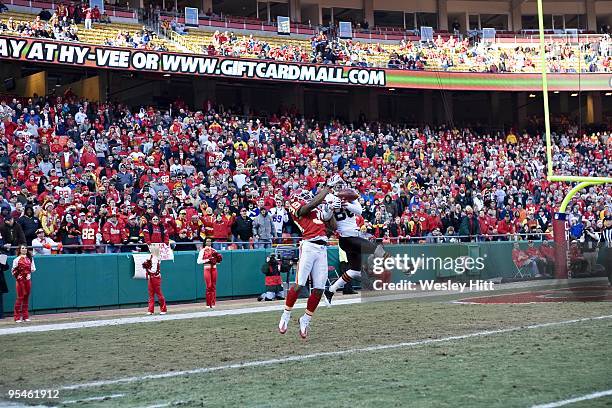 Defensive back Brandon Carr of the Kansas City Chiefs knocks away a pass in the end zone thrown to wide receiver Chansi Stuckey of the Cleveland...