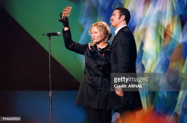 George Michael et la styliste Agnès B lors de la soirée MTV European awards en novembre 1995 à Paris, France.