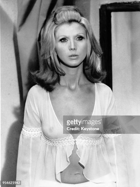 Italian actress Erna Schurer wearing a diaphanous nightgown during the filming of 'This Love so Tender, So Violent', aka 'Le tue mani sul mio corpo',...