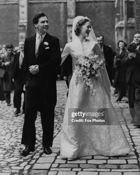 British actress and ballet dancer Moira Shearer leaves the Chapel Royal at Hampton Court Palace, London, with her husband, broadcaster Ludovic...