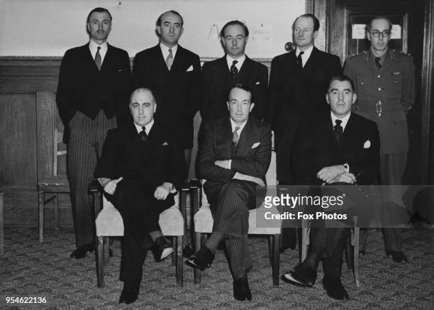 The British Prosecuting Counsel at the Nuremberg Trials in Germany, 1st December 1945. From left to right Major J. Harcourt Barrington, Major Elwyn...