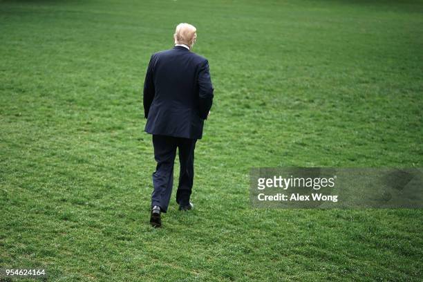 President Donald Trump walks on the South Lawn prior to his departure from the White House May 4, 2018 in Washington, DC. President Trump is heading...