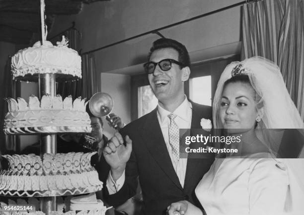 Spanish actress and singer Carmen Sevilla with Spanish composer Augusto Alguero after their wedding in Saragossa , Spain, 27th February 1961.